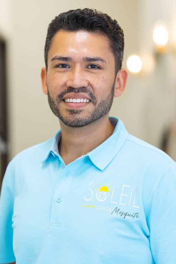 Dr. Jose Aldana smiling in a hallway of the Mesquite office