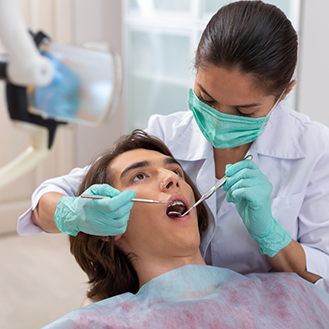Young man receiving a dental exam