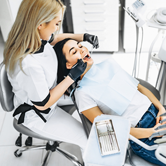 Woman receiving a dental exam