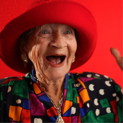 Senior woman with no teeth grinning wide
