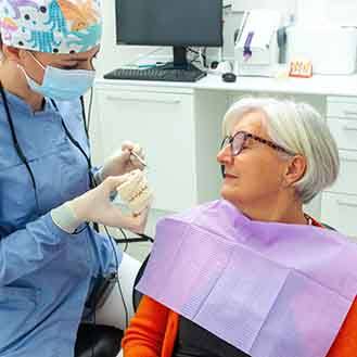 The procedure for implant dentures requires a minor surgery to install several dental implants in your jaw