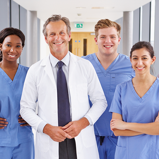 Four smiling Mesquite dental team members
